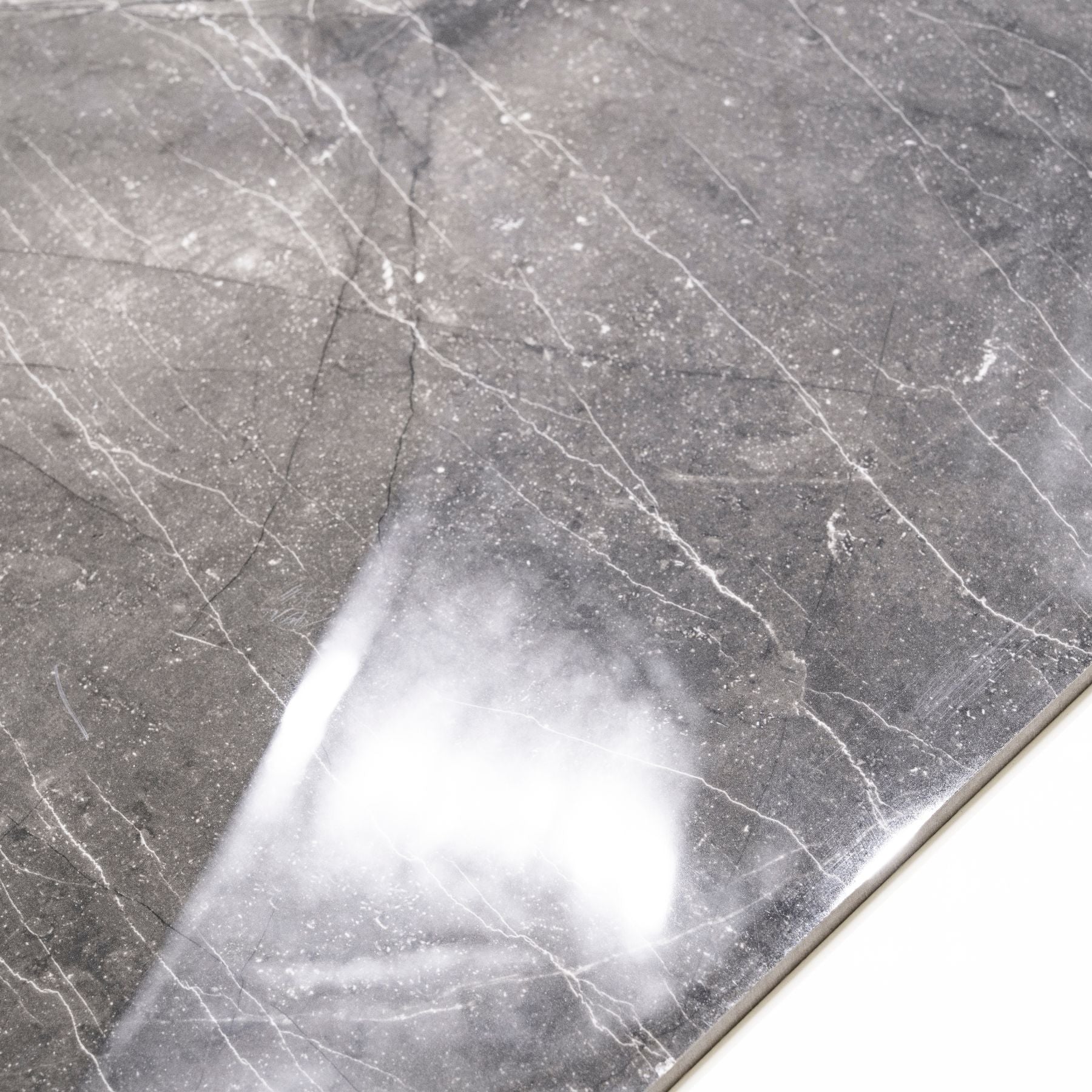 Armani Grey glossy marble effect porcelain tile 60x120cm with 9mm thickness features elegant grey tones and polished luxury finish.