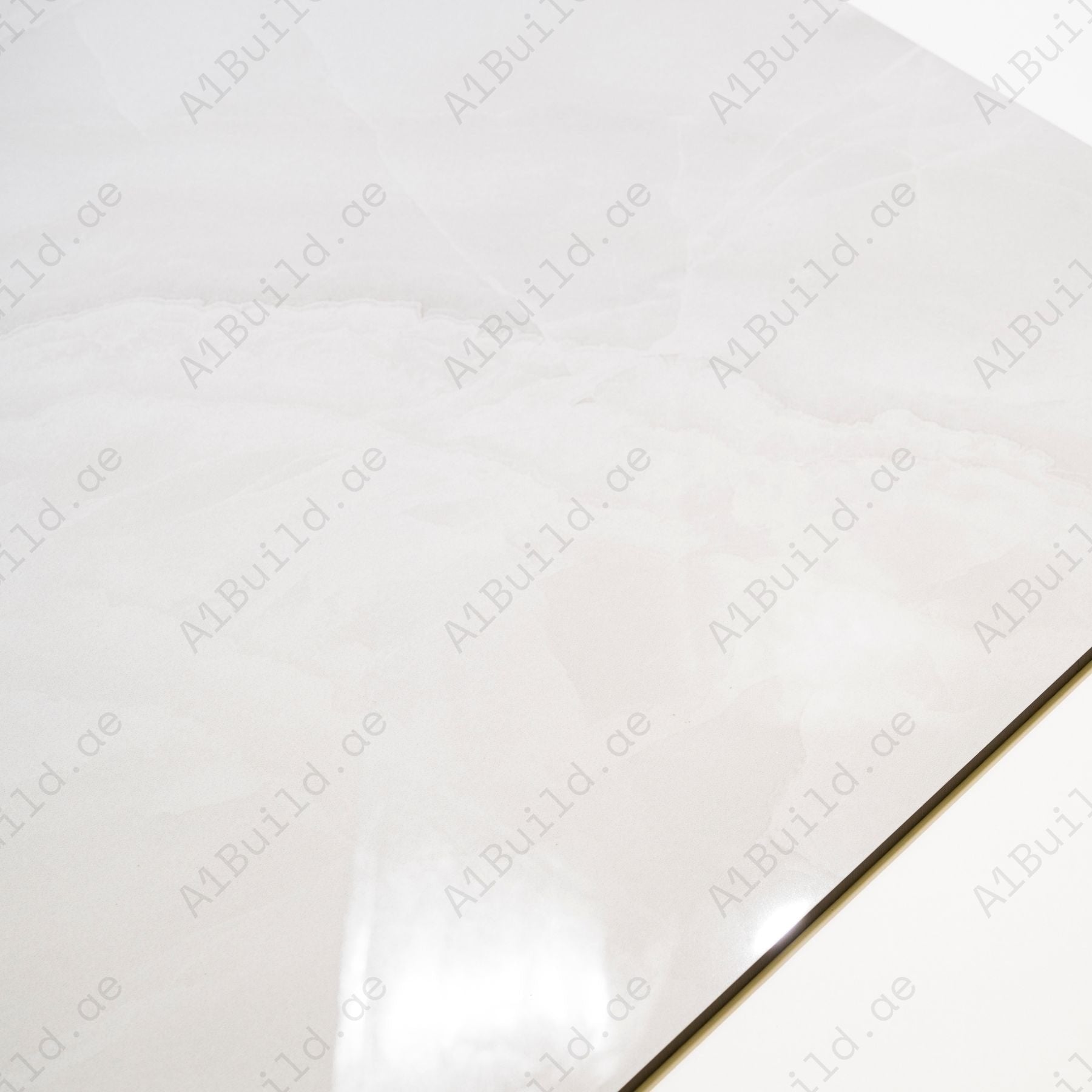 Artico Onyx Bianco glossy marble effect porcelain tile 60x120cm with 9mm thickness features white base, delicate veining, subtle onyx patterns & polished finish