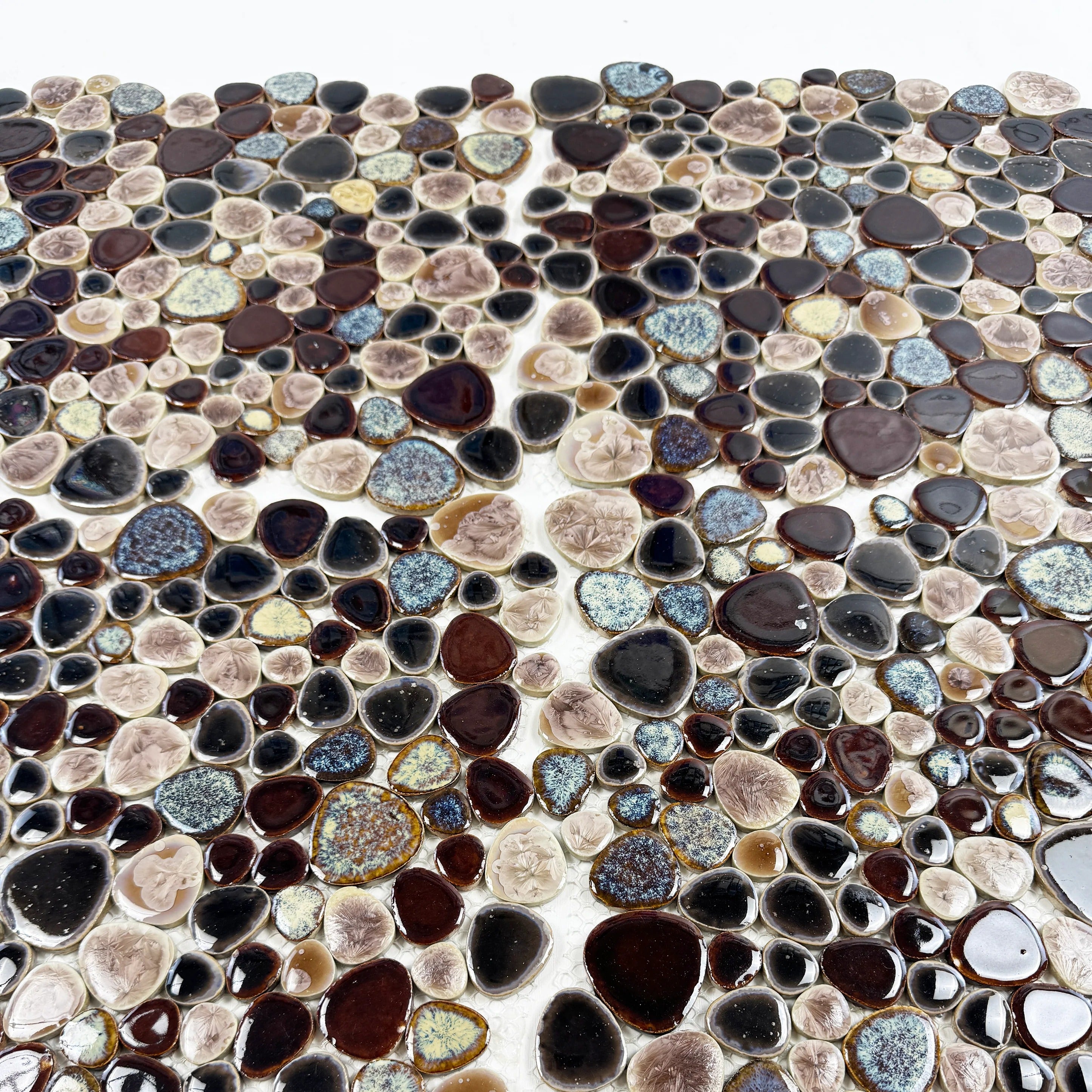 Brown mixed round ice crack porcelain mosaic tile for walls, bathrooms, and kitchens. Durable, water-resistant, and stylish for modern decorative interiors.