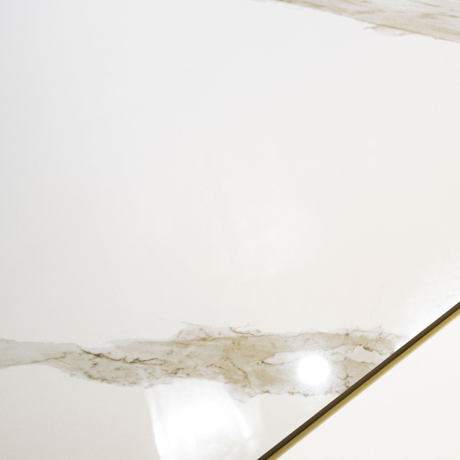 Calcatta Noir glossy marble effect porcelain tile 60x120cm with 9mm thickness features white base, bold black veining and polished finish.