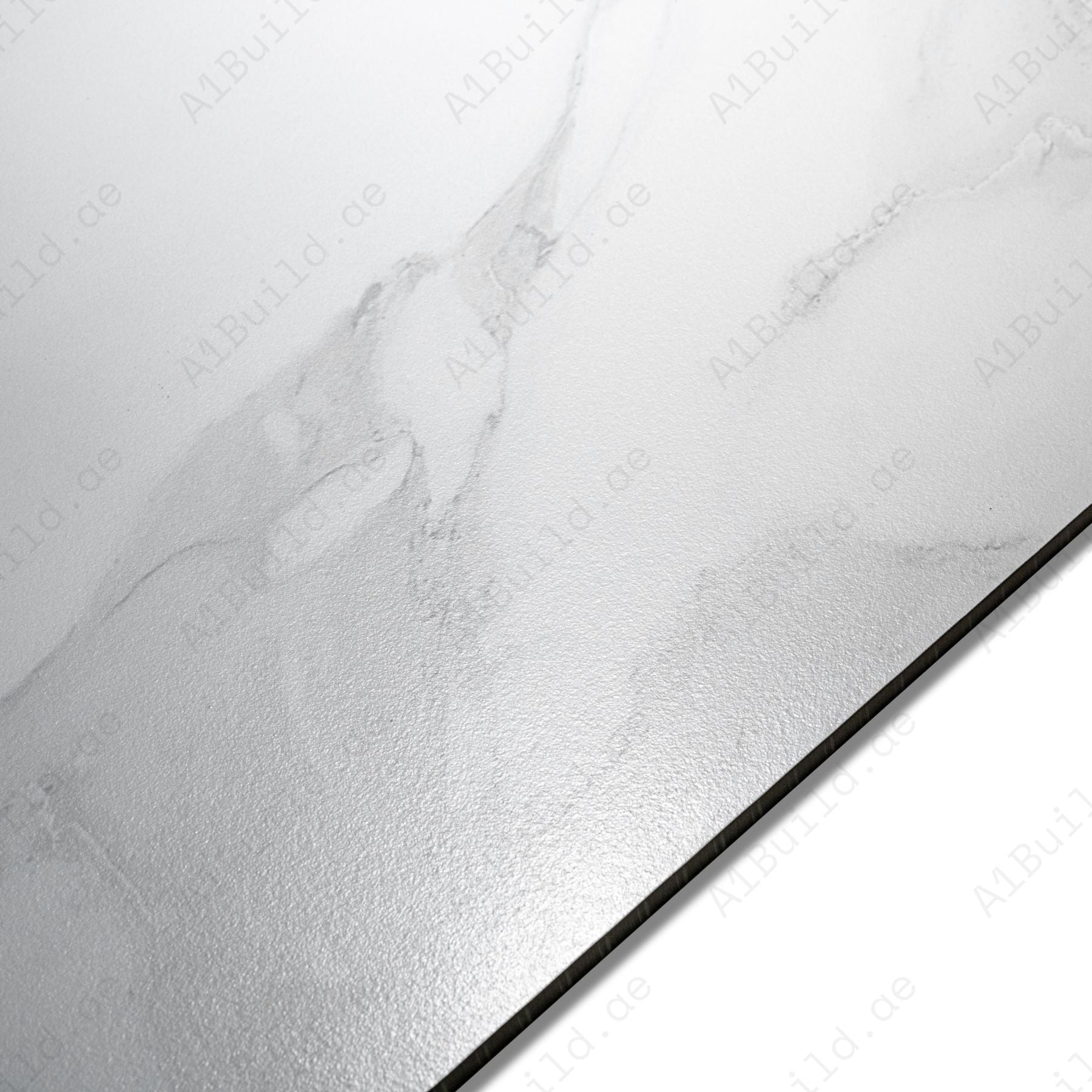 Cloud White porcelain tile in 60x120cm size with soft marble effect, clean white tones and durable 9mm thickness for walls and floors.