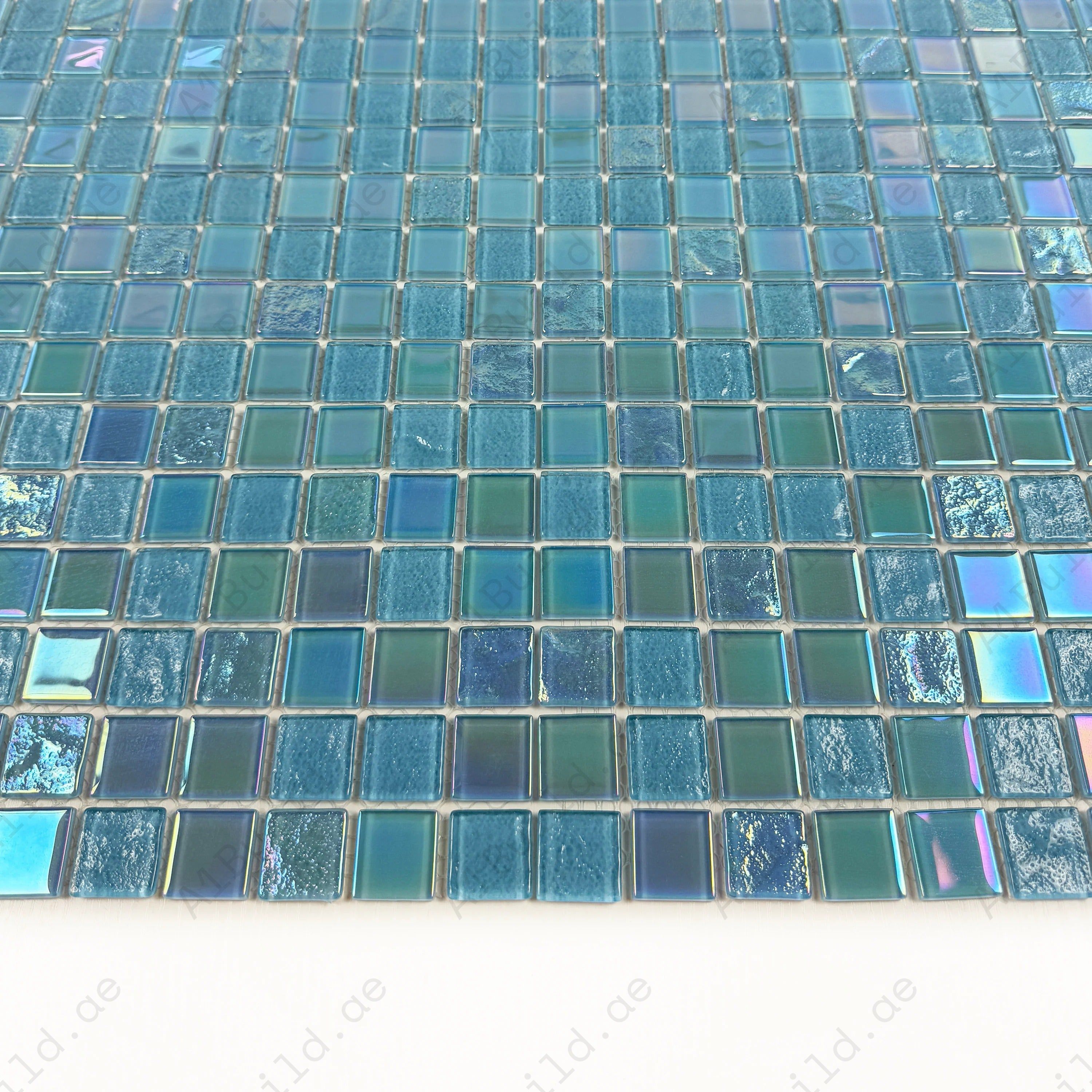 Enhance your pool with Sky & Nile Blue Iridescent Glass Mosaic Tiles. Durable, non-toxic, UV & slip resistant. Perfect for pools, spas & feature walls.