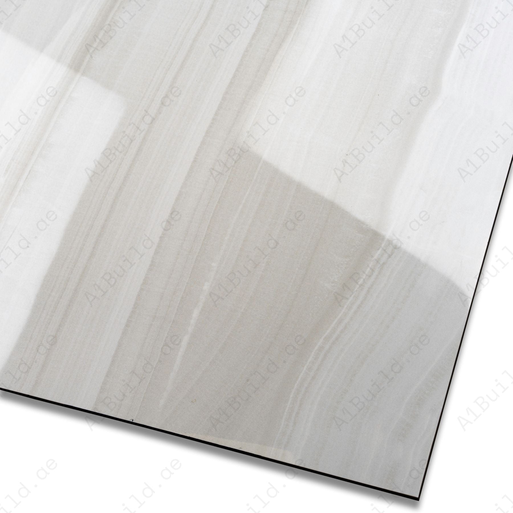 Explore the GLACIER WHITE large format porcelain tile, 60x120cm with a glossy marble-look finish. Durable 9MM porcelain tile ideal for floors and walls, offering elegance, easy installation, and lasting beauty.
