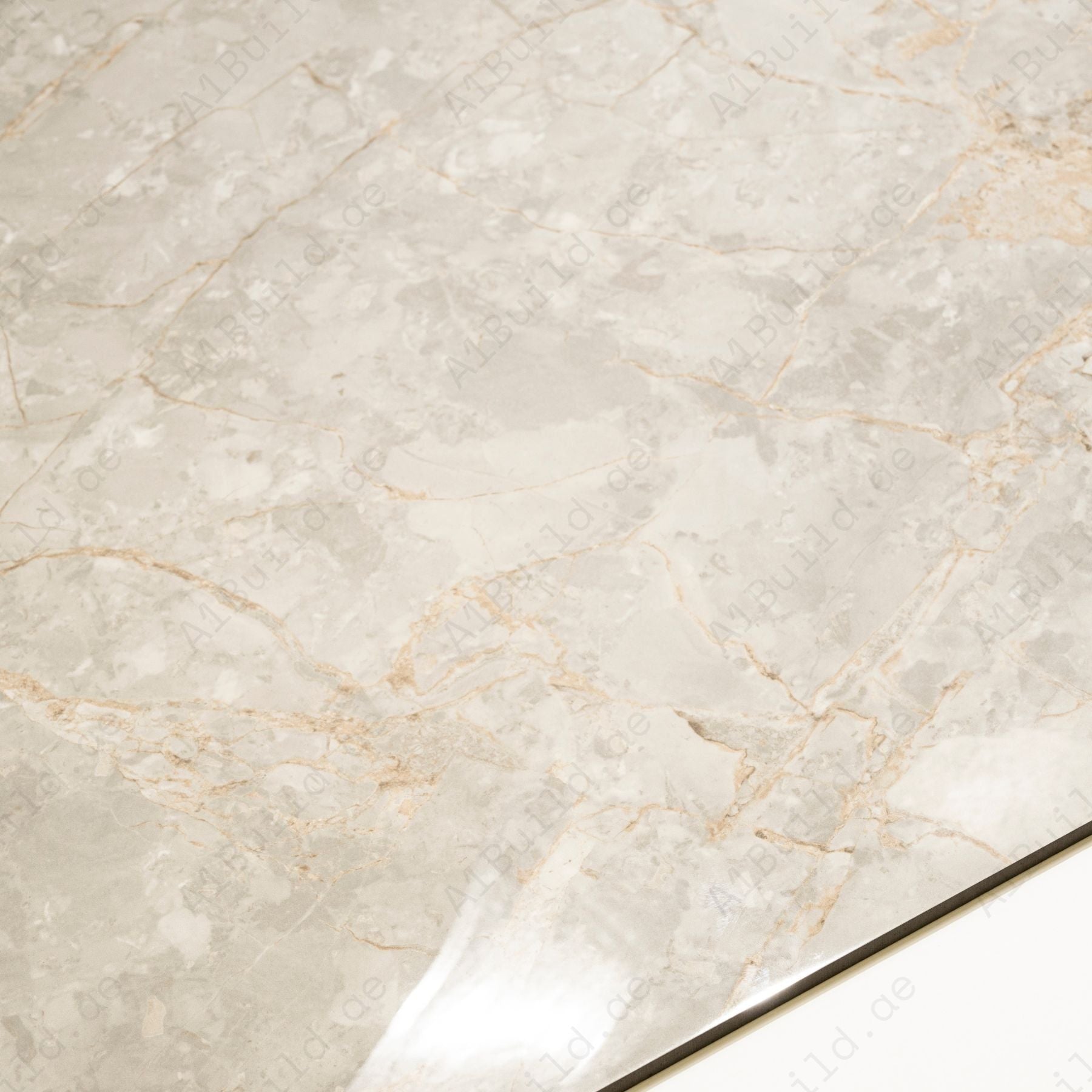 Ivory Gold glossy marble porcelain tile 60x120cm with 9mm thickness features warm ivory base, golden veining and elegant polished finish.