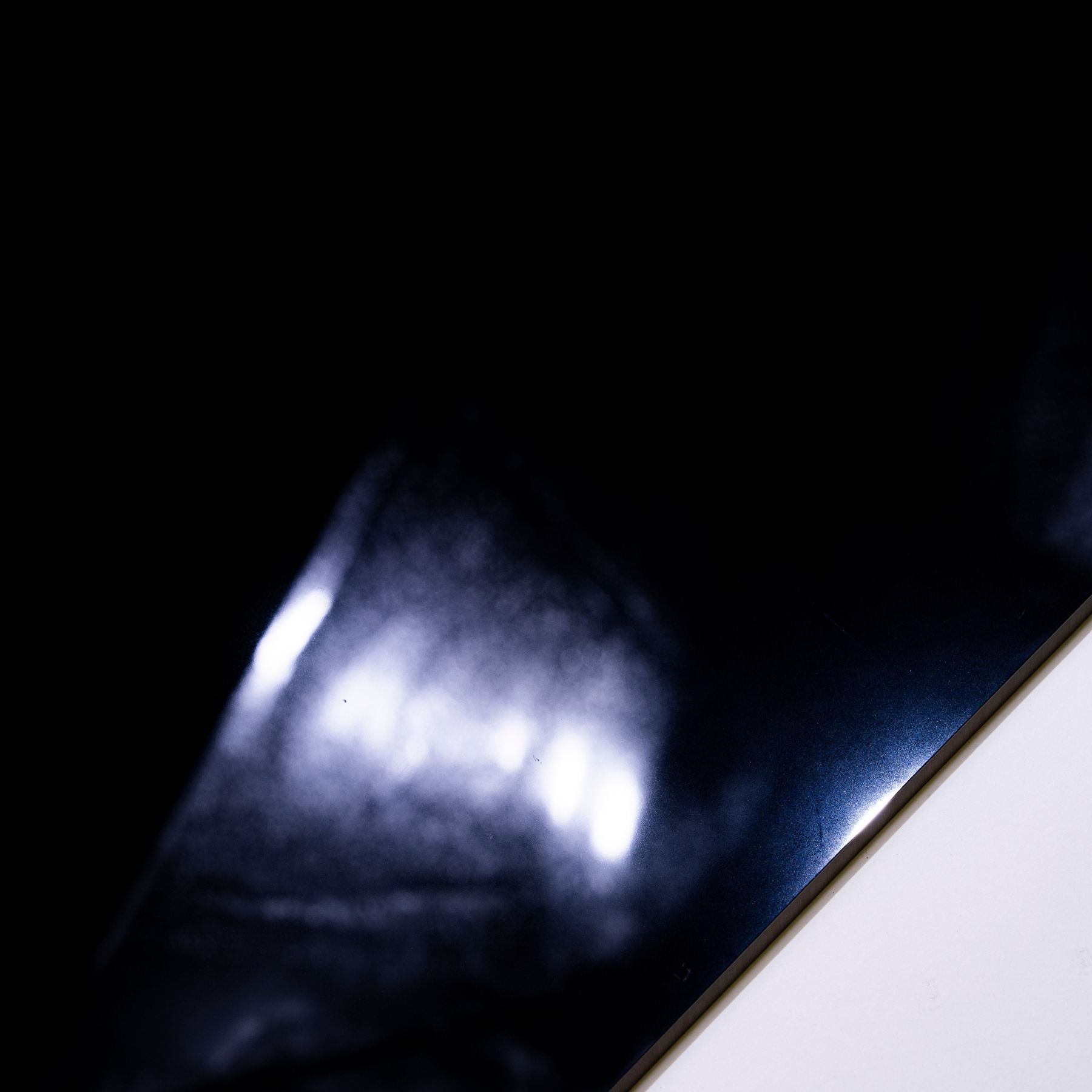 Jet Black glossy porcelain tile 60x120cm with 9mm thickness features deep solid black tone and polished luxury finish for modern interiors.