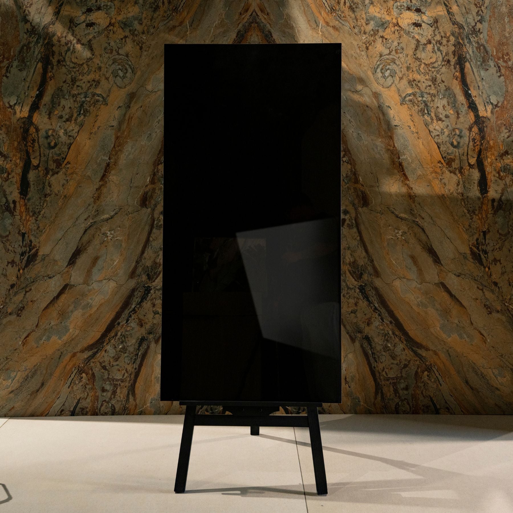 Jet Black glossy porcelain tile 60x120cm with 9mm thickness features deep solid black tone and polished luxury finish for modern interiors.