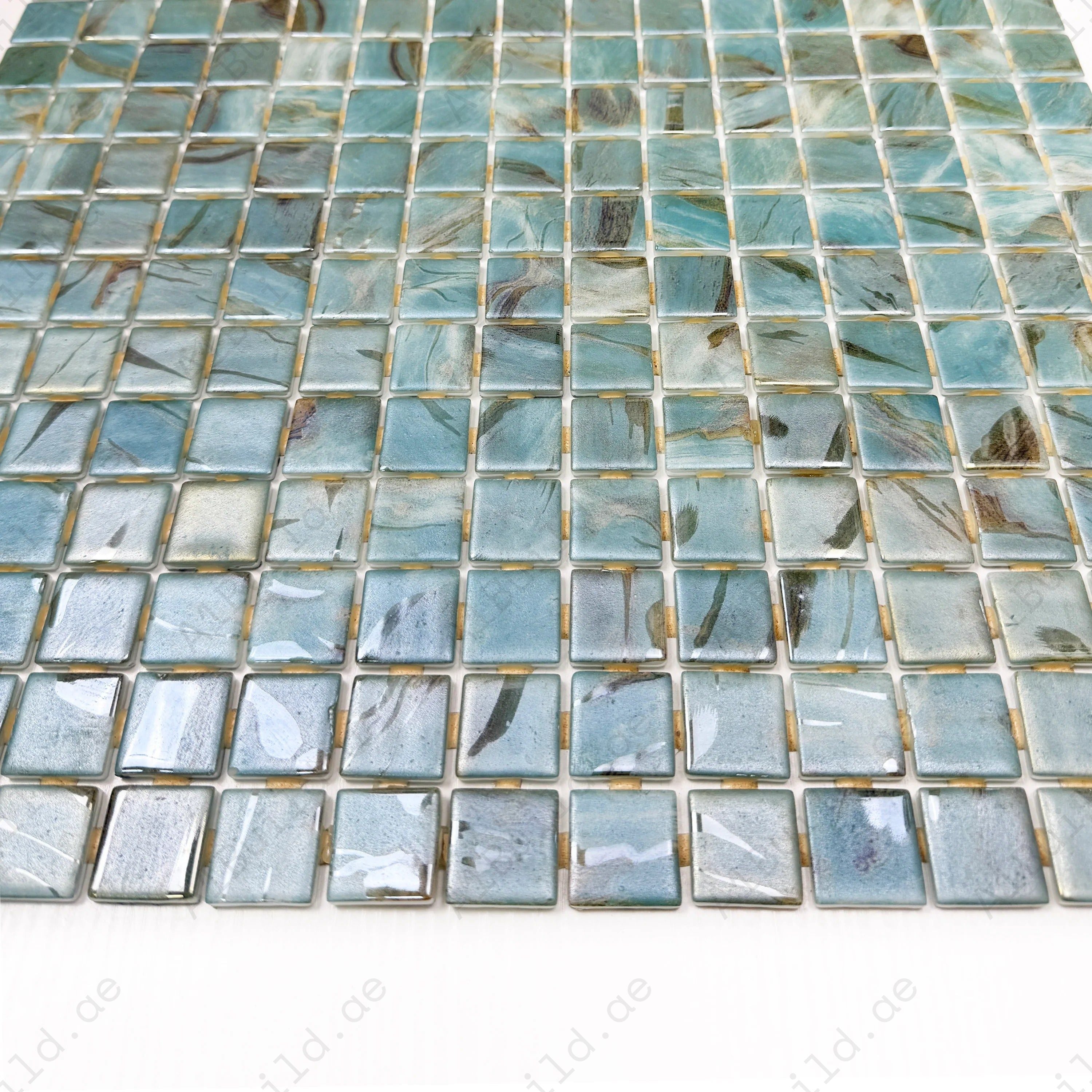 Recycled glass mosaic in light blue, Nile blue & coffee brown with streaked texture. UV-resistant, slip-proof & durable—ideal for pools, spas & feature walls.