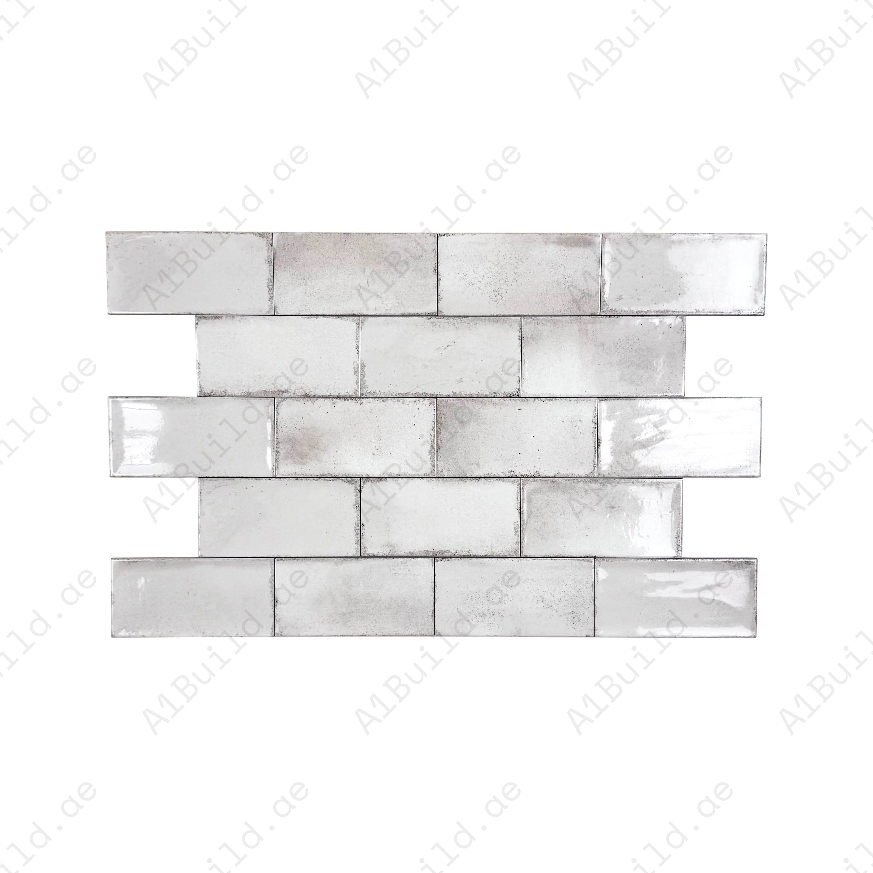 Sandy Beige Glossy Ceramic Tile – Premium long-strip tile with a glossy finish, ideal for elegant walls, kitchens, bathrooms, and modern living spaces.