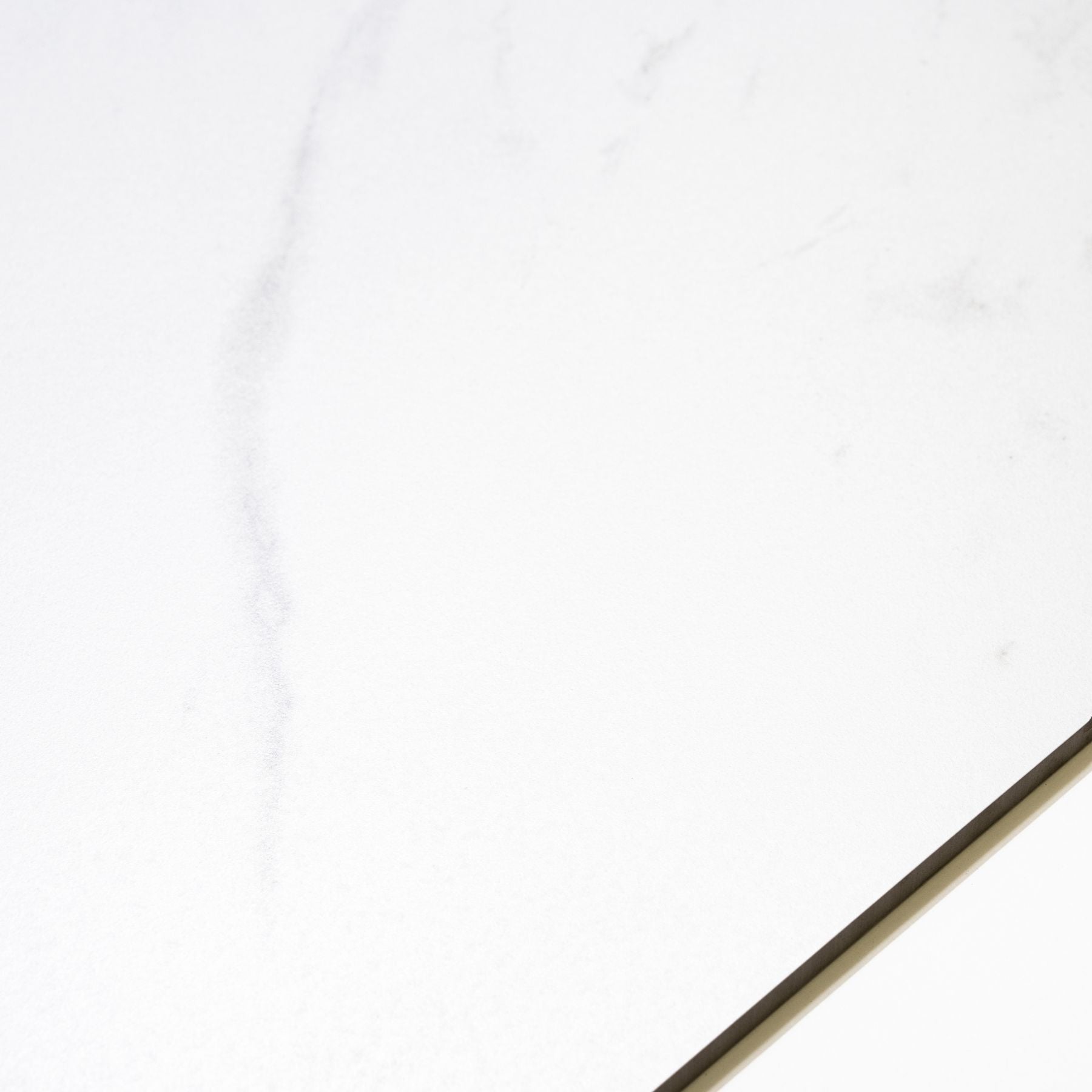 Statuario Pulido matt marble effect porcelain tile 60x120cm with 9mm thickness features white base, soft grey veining and smooth finish.