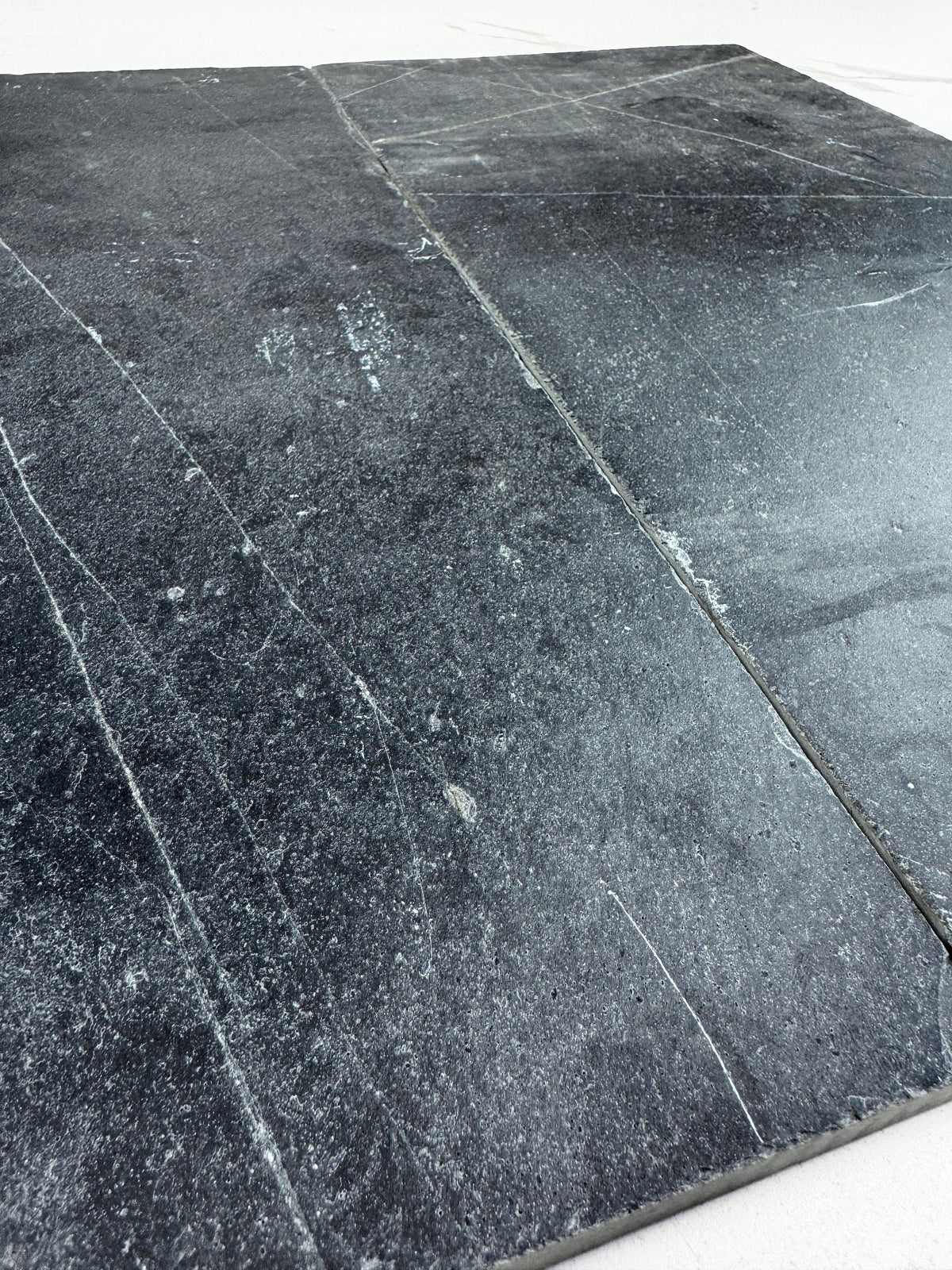 Upgrade interiors & exteriors with Garden Stone P018 Black Slate Tile featuring rich black tones, natural texture, lasting durability for walls, floors & patios