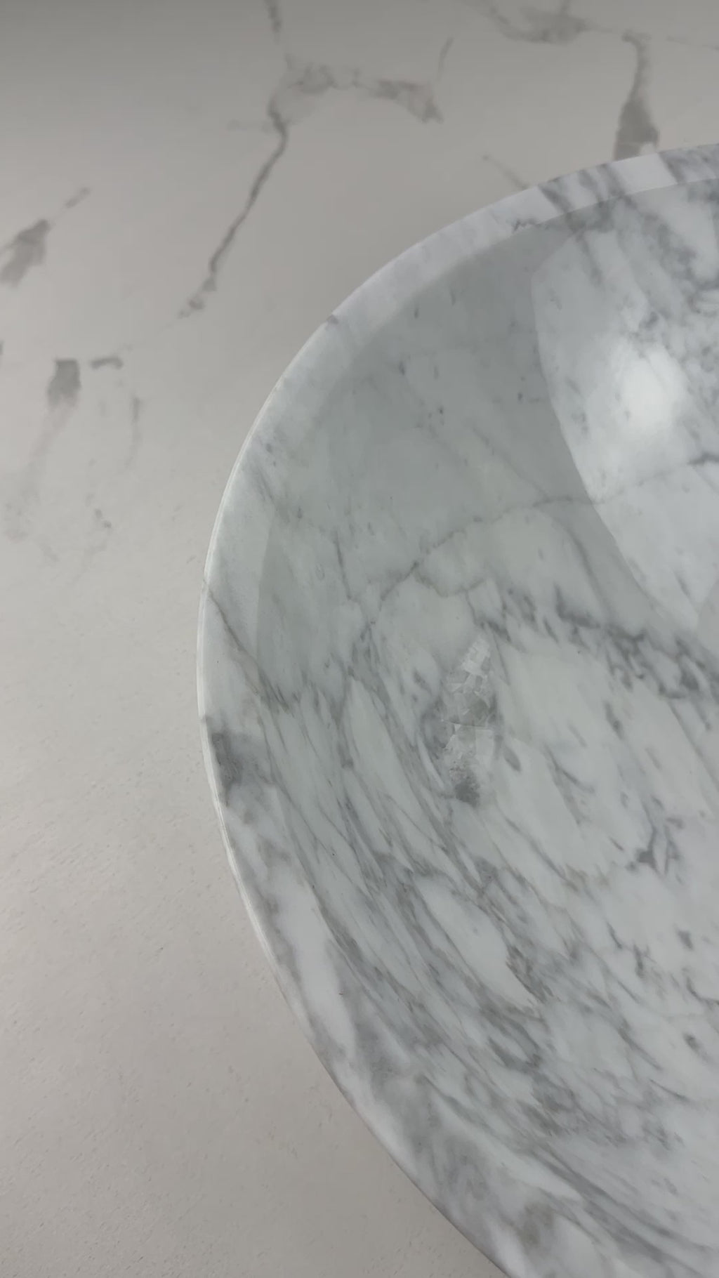Add timeless elegance to your bathroom with the Marble Muse Carrara White Round Wash Basin, crafted from premium polished marble for lasting beauty and style.