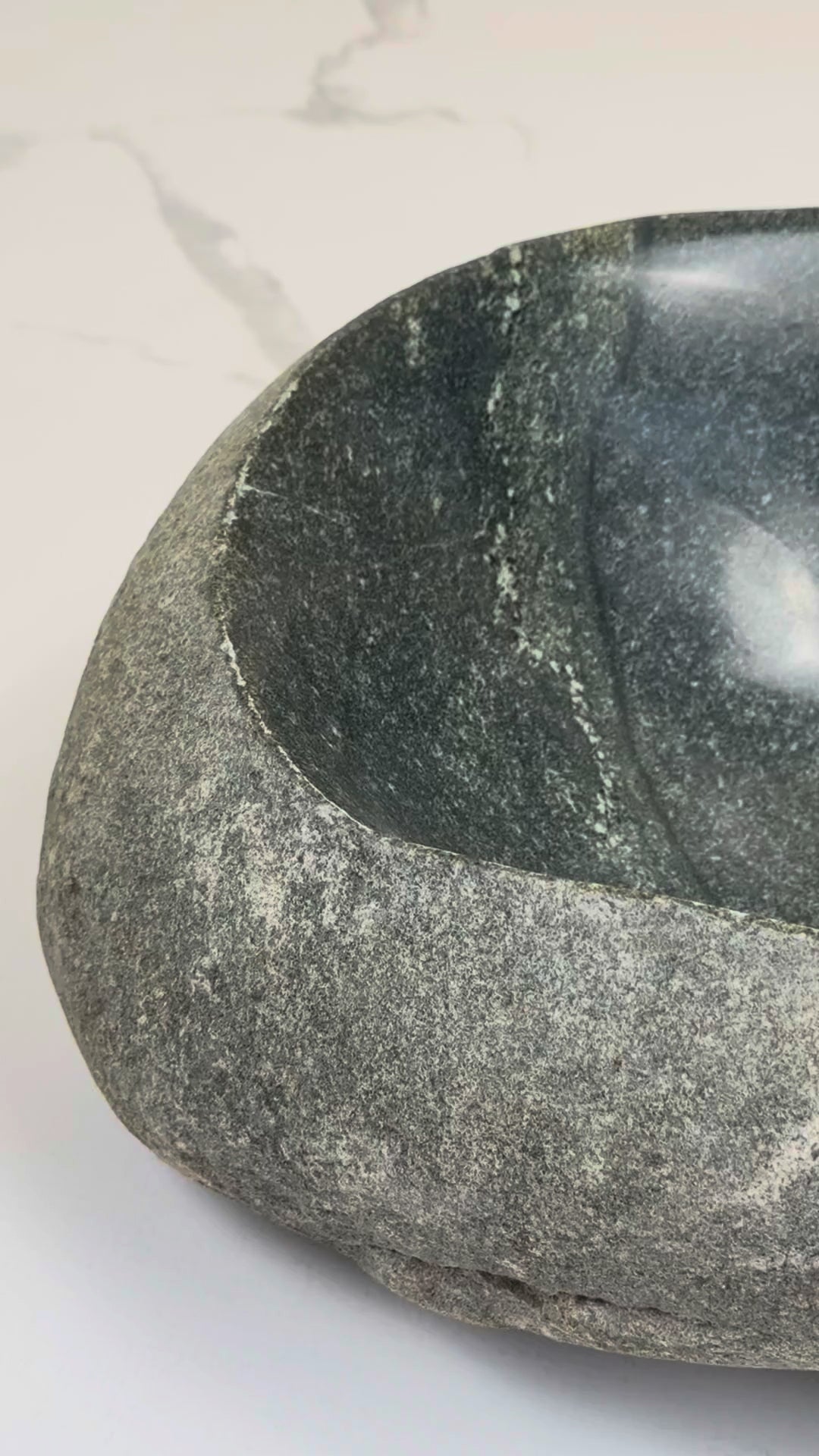 Add natural charm to your bathroom with the Marble Muse Pebble Stone Polished Irregular Wash Basin, crafted from premium marble for timeless elegance.