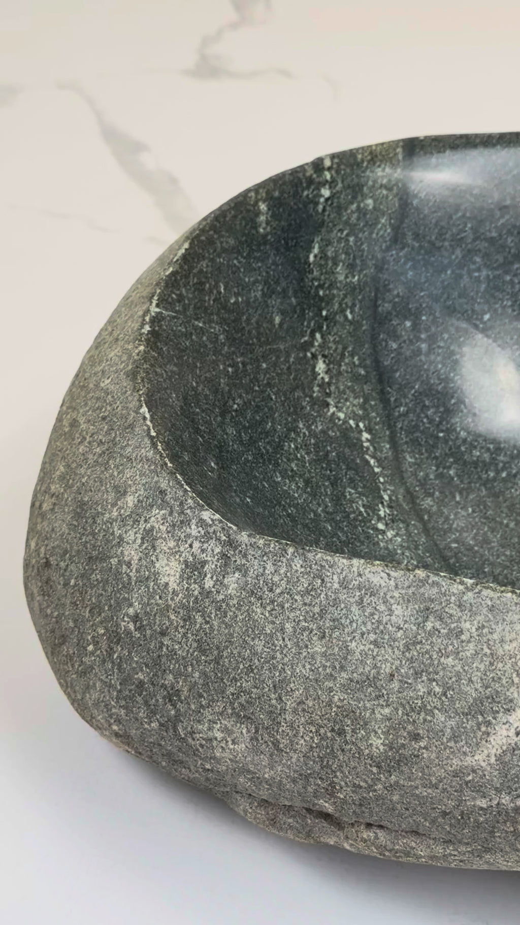 Add natural charm to your bathroom with the Marble Muse Pebble Stone Polished Irregular Wash Basin, crafted from premium marble for timeless elegance.